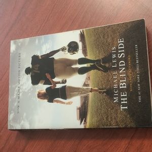 Michael Lewis paperback book The Blind Side novel